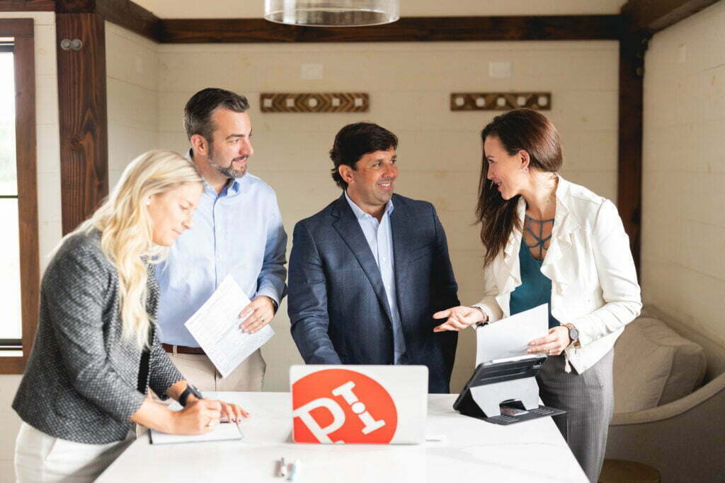 predictive index consultants gathered around a table